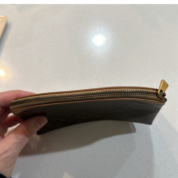 This brown and light tan beautiful Celine pouch has SO much life in it! - Picture 5 of 9